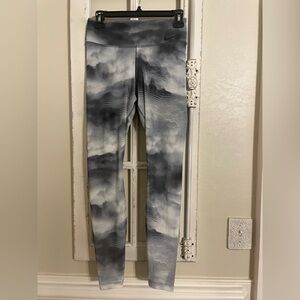 Nike Black and Gray mesh patterned Leggings with built in black spandex shorts.